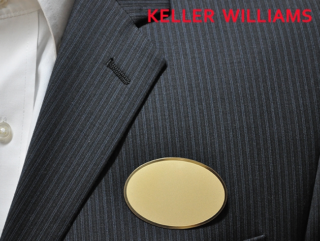 KW logo on frosted gold oval 